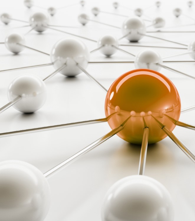 Network of white spheres with one orange sphere